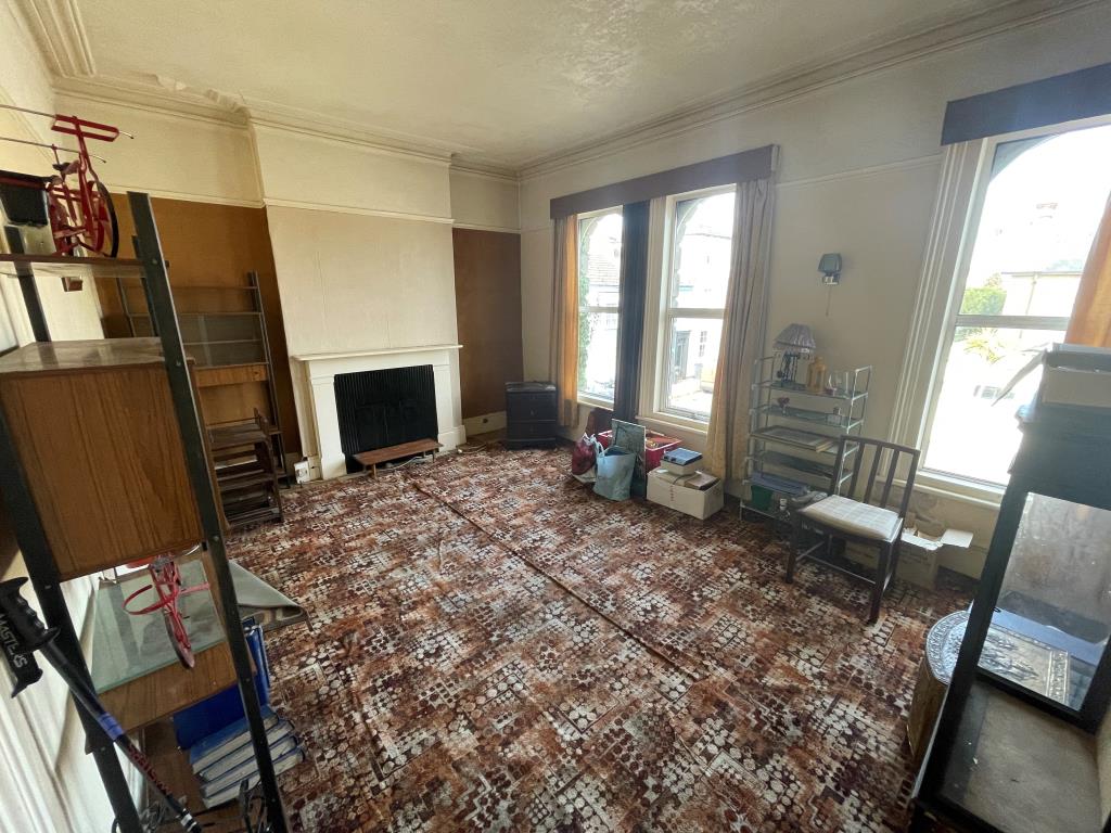 Lot: 134 - FOUR-BEDROOM PROPERTY WITH PARKING FOR REFURBISHMENT - Front bedroom with three windows